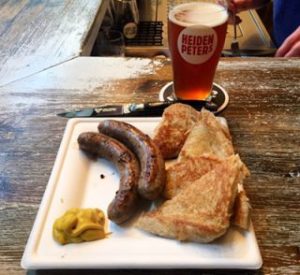 Wildschweinbratwurst mit Orange, Limette, Kakao und Coffee IPA